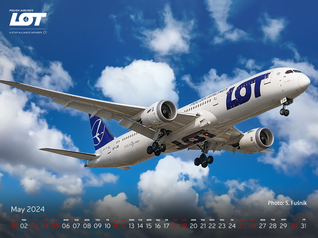 Passenger airplane against a sky with clouds.